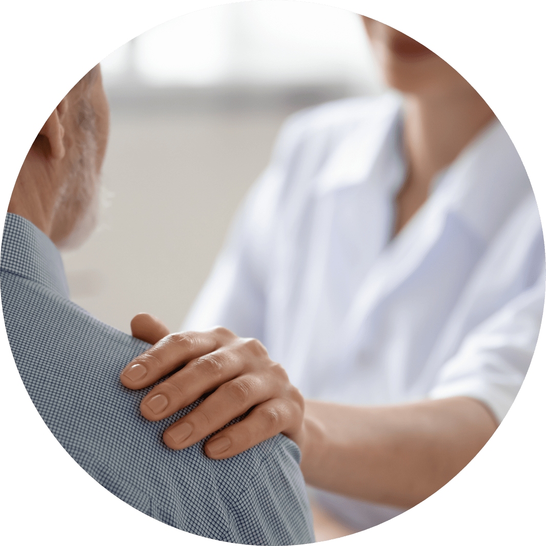 This is an image of someone putting their hand on another persons shoulder