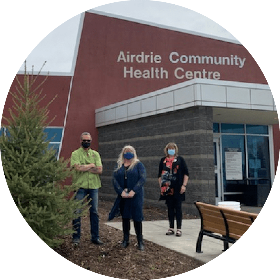 people standing outside of the Airdrie Community Health Centre