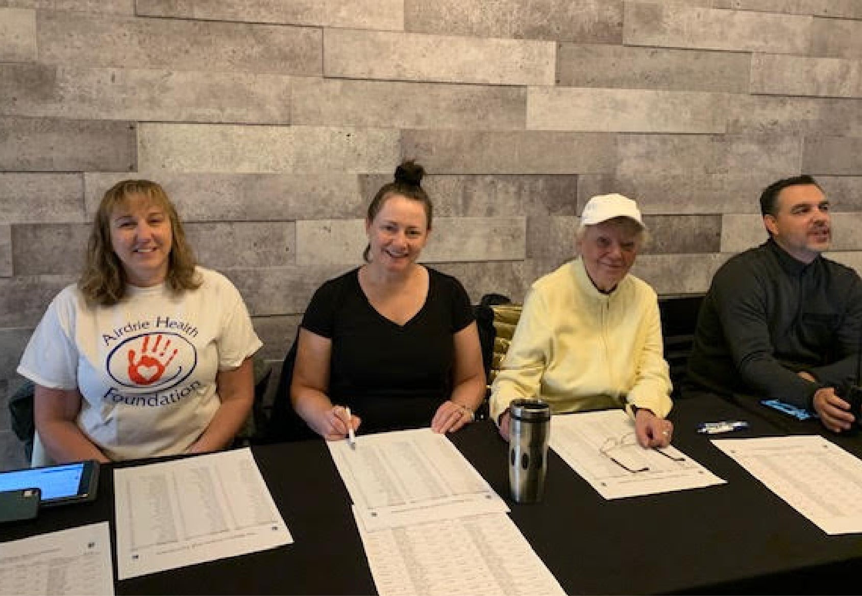 a picture of a group of people at a fundraiser.