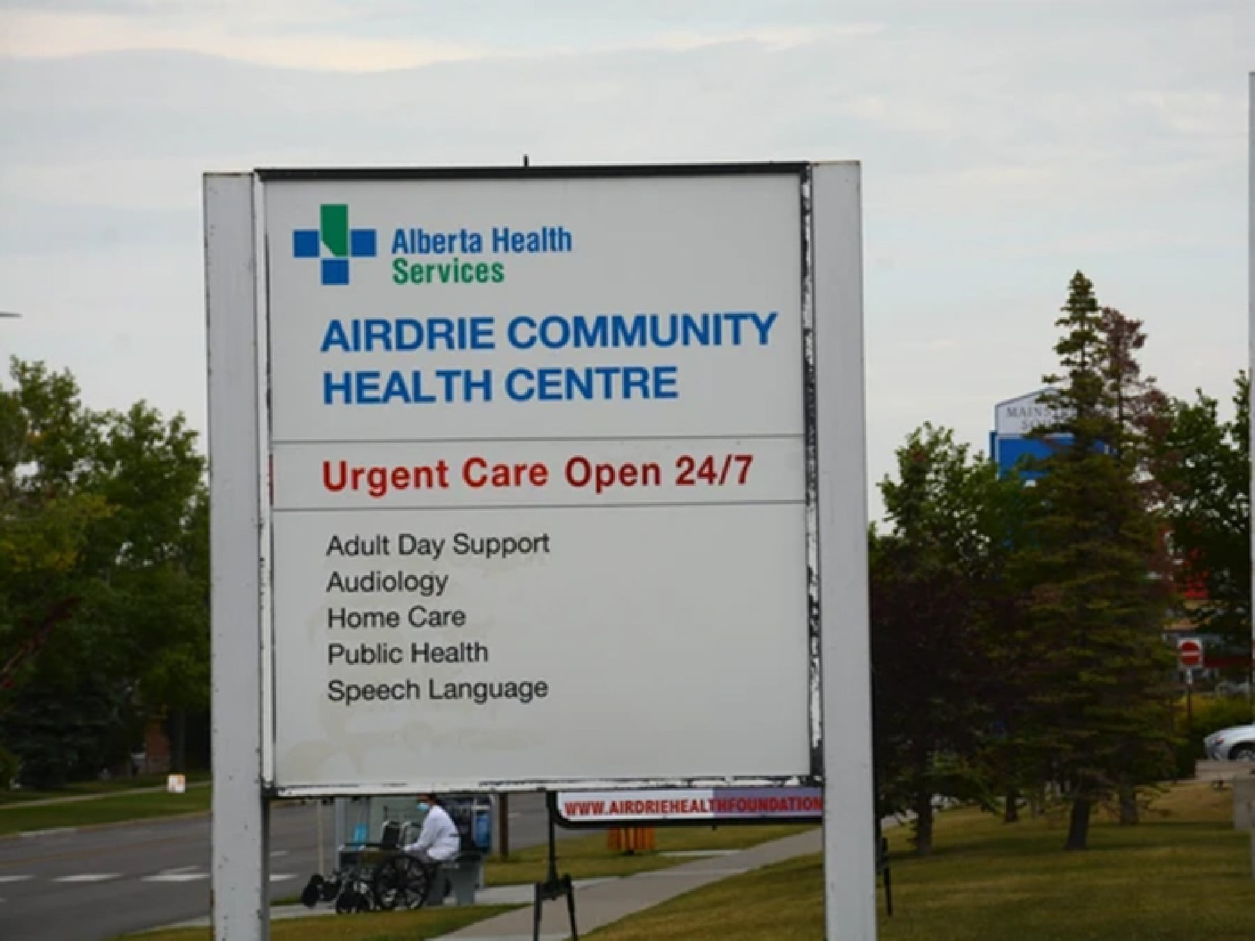 Airdrie Community Health Centre Urgent Care Open 24/7 sign