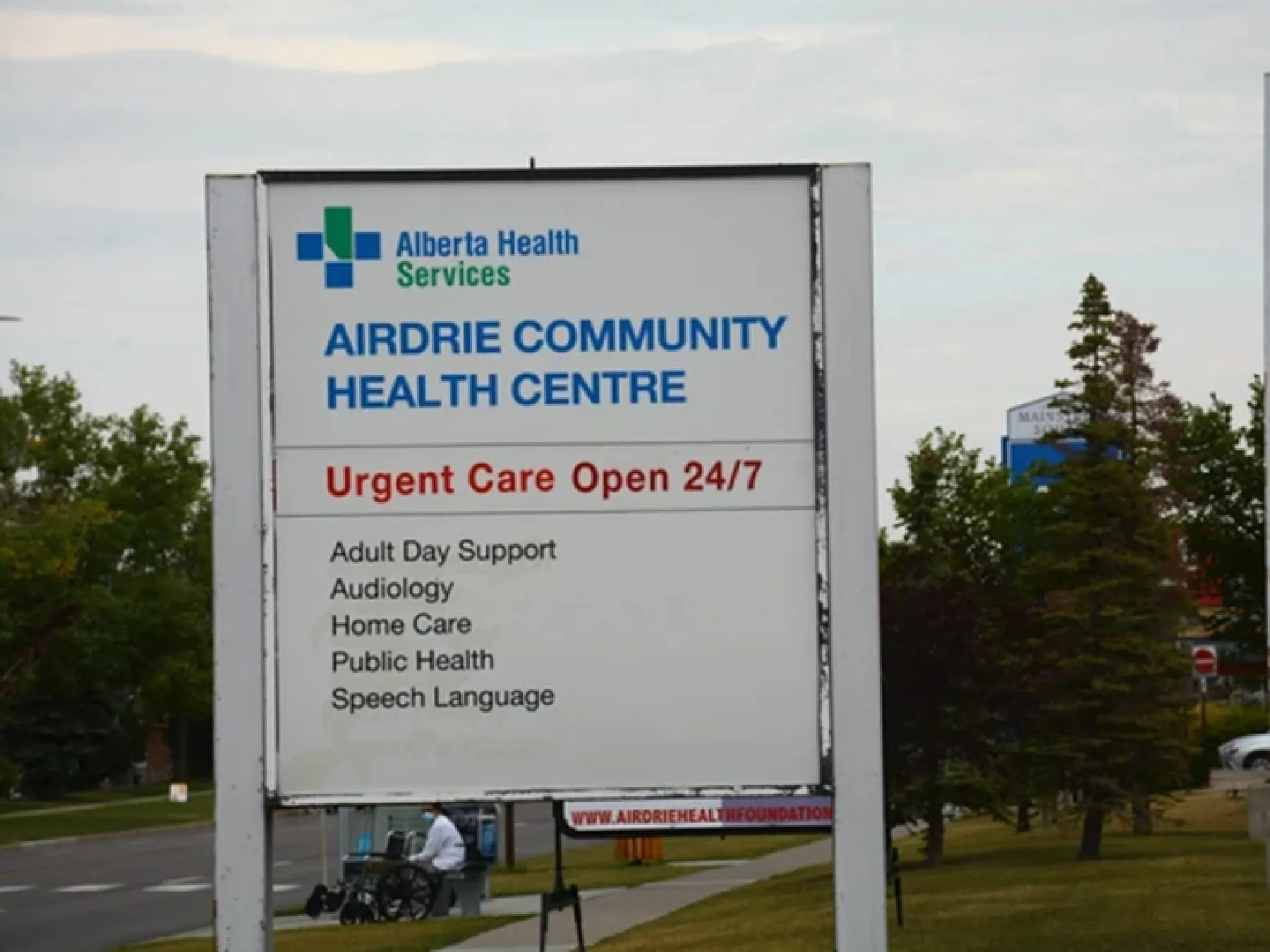 Airdrie Community Health Centre Urgent Care Open 24/7 sign